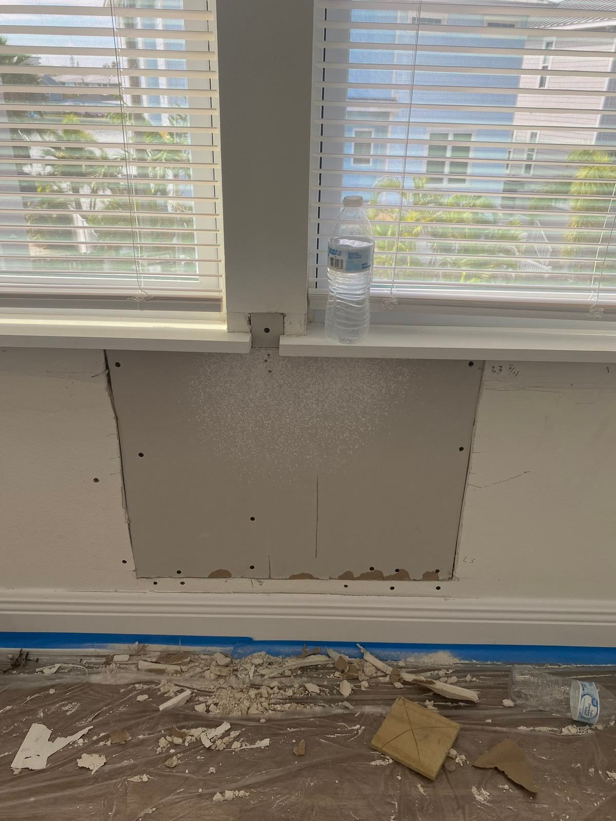 Before: patched wall below window, texture not blended