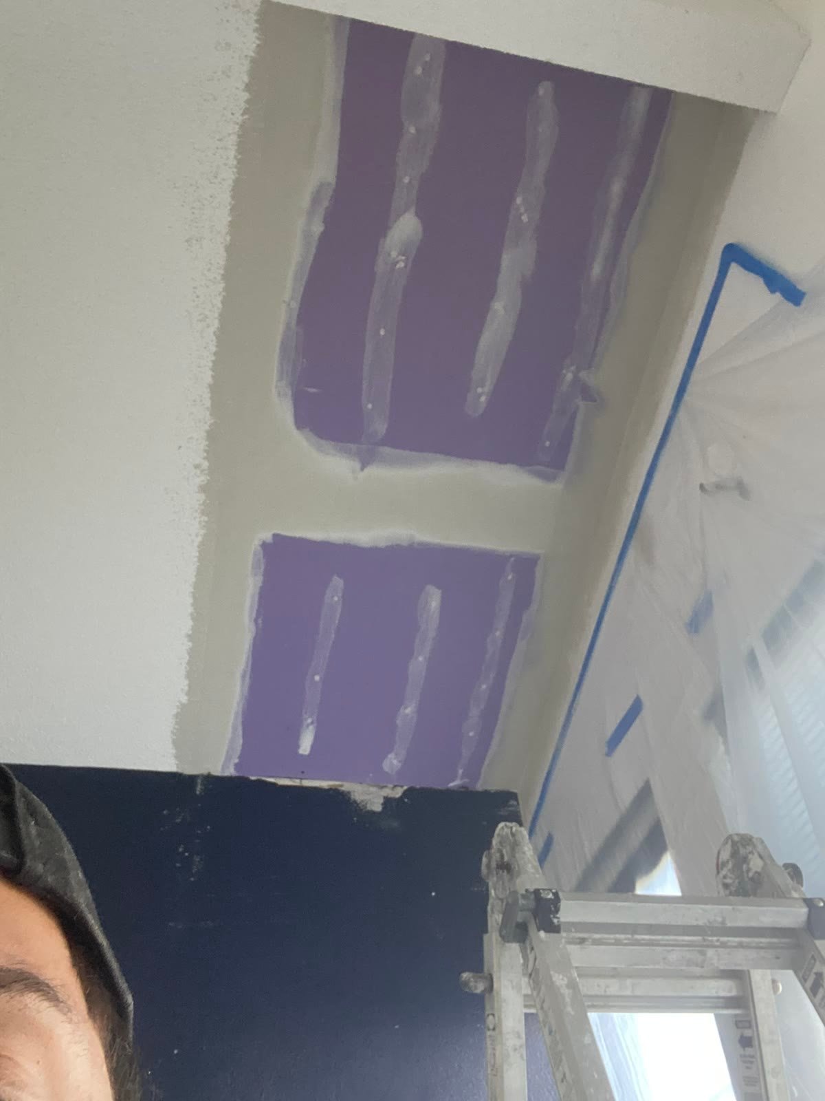 New drywall seams taped and mudded