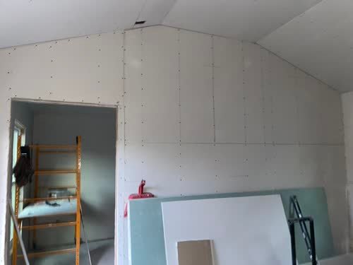New drywall hung in a room